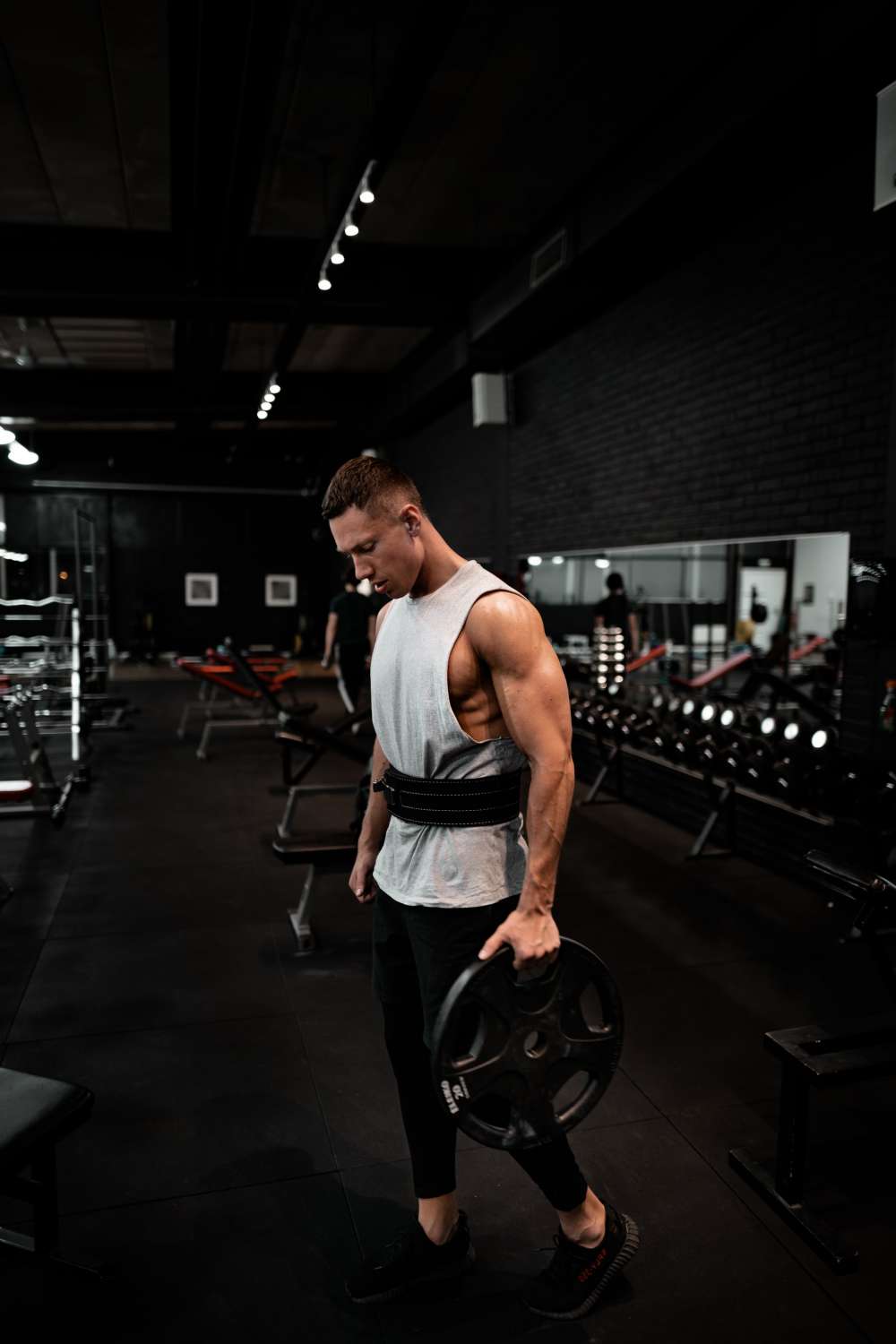 VGL Fitness Anabolic Steroids UK man weight training in a gym environment.